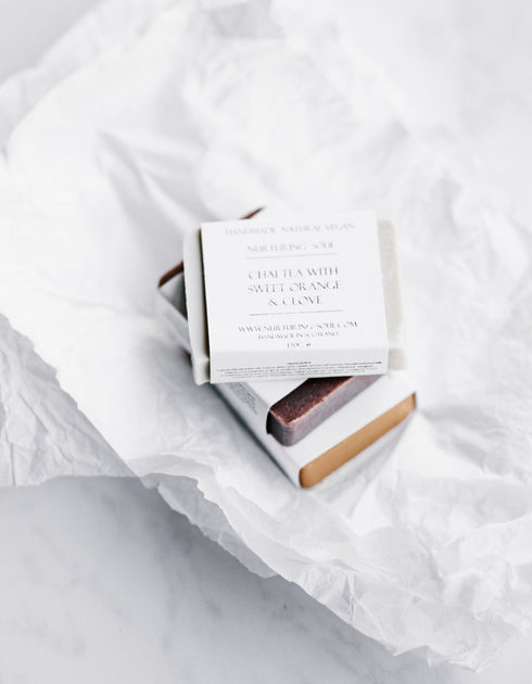 Several stack of bar soap on white surface